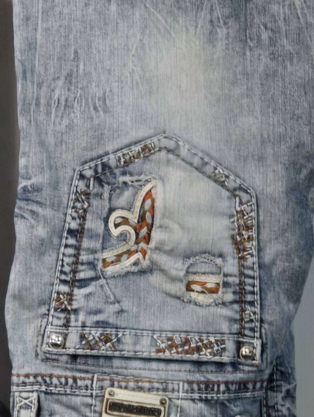 Rock Revival Light Blue Distressed Jeans with Embroidered Pocket